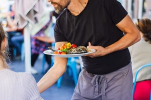 waiter-serving-food-customers-tip-wages